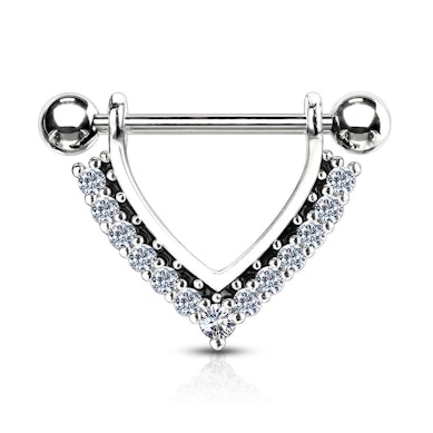 Bröstpiercing med stendekorerad v-form