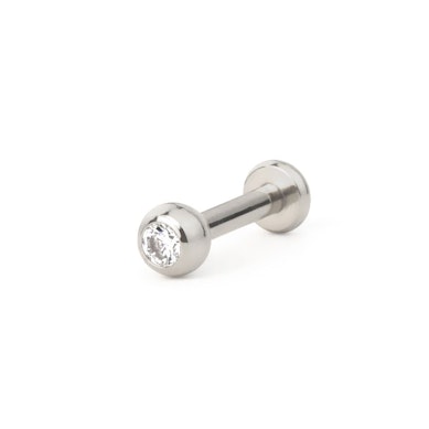Labret gjord av titan med kula och invändig tråd