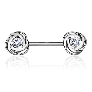Bröstpiercing med sten i ros