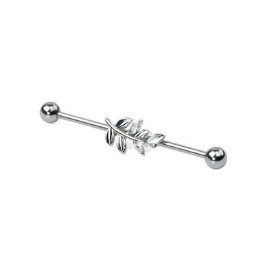Industrial piercing med blad på gren