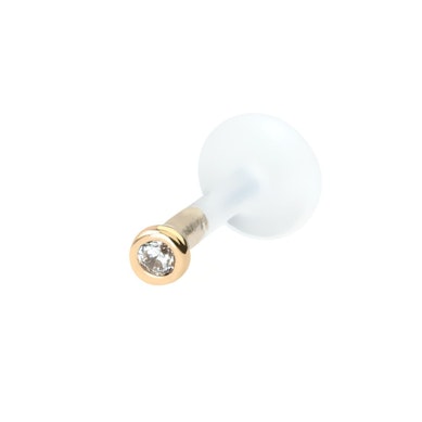 Labret av 14 karats guld med stenar och ptfe stav