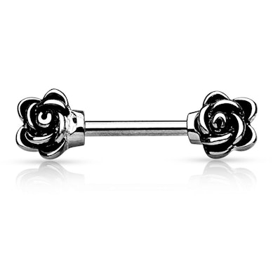 Bröstpiercing med rosor