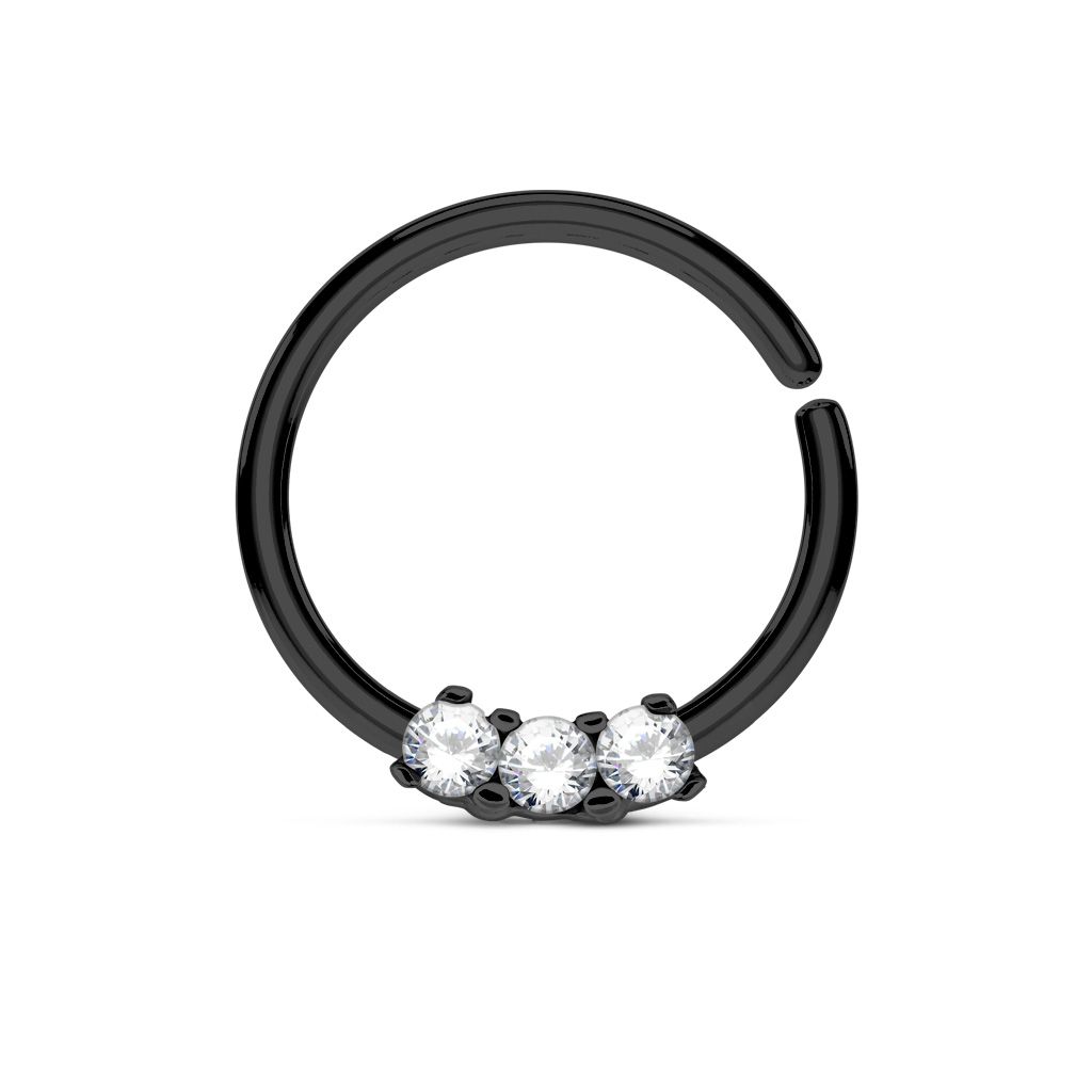 Liten septumpiercing med stenar