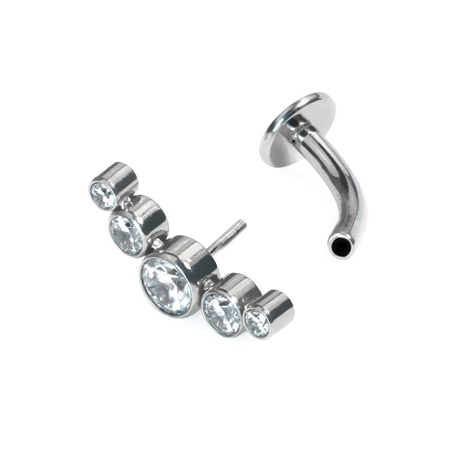 Svävande navelpiercing i titan med kristaller