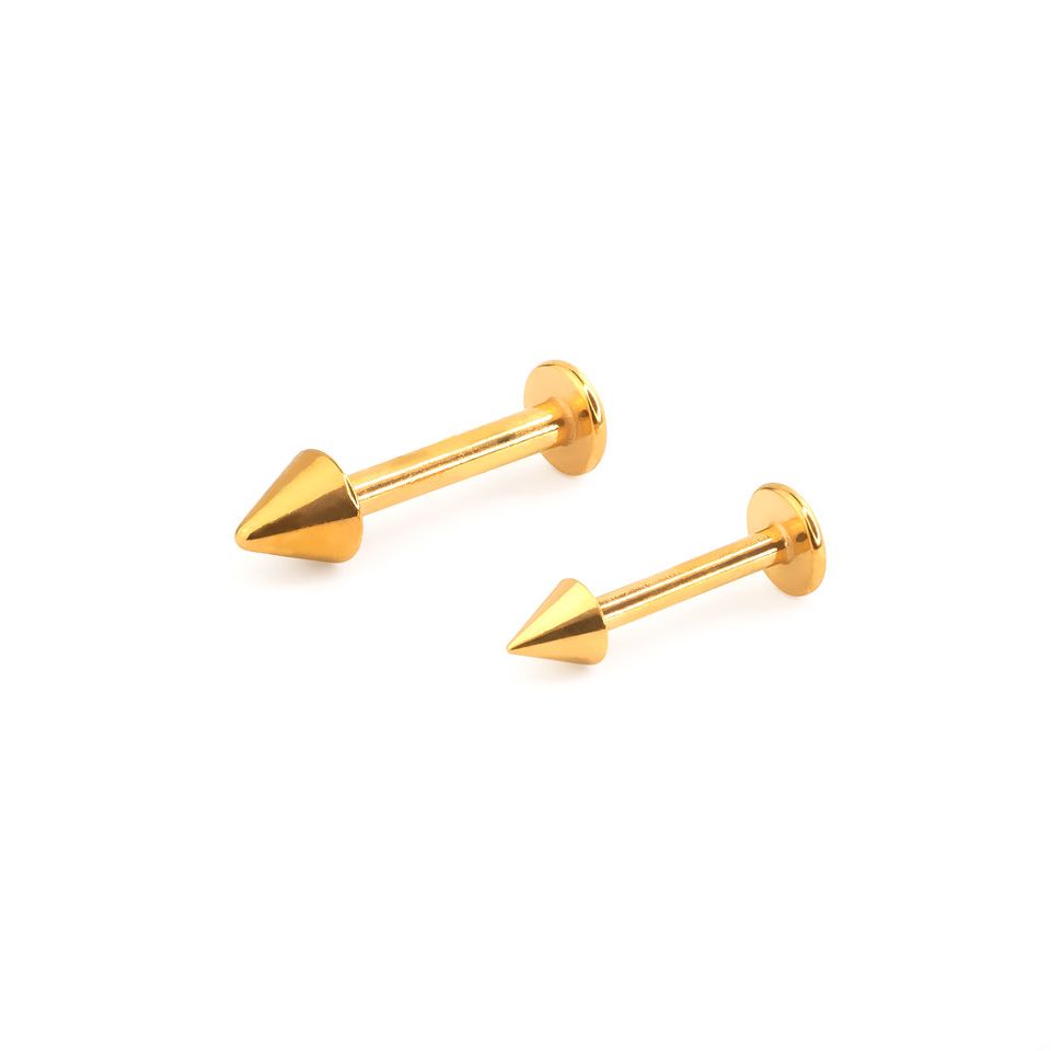 Labret i flera färger med spikar