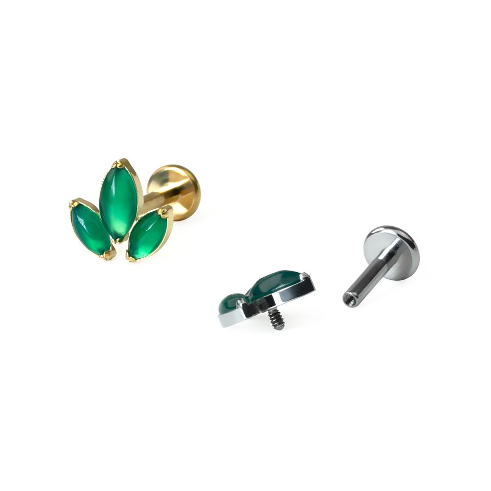 Titanlabret med trio av marquise-slipade naturstenar