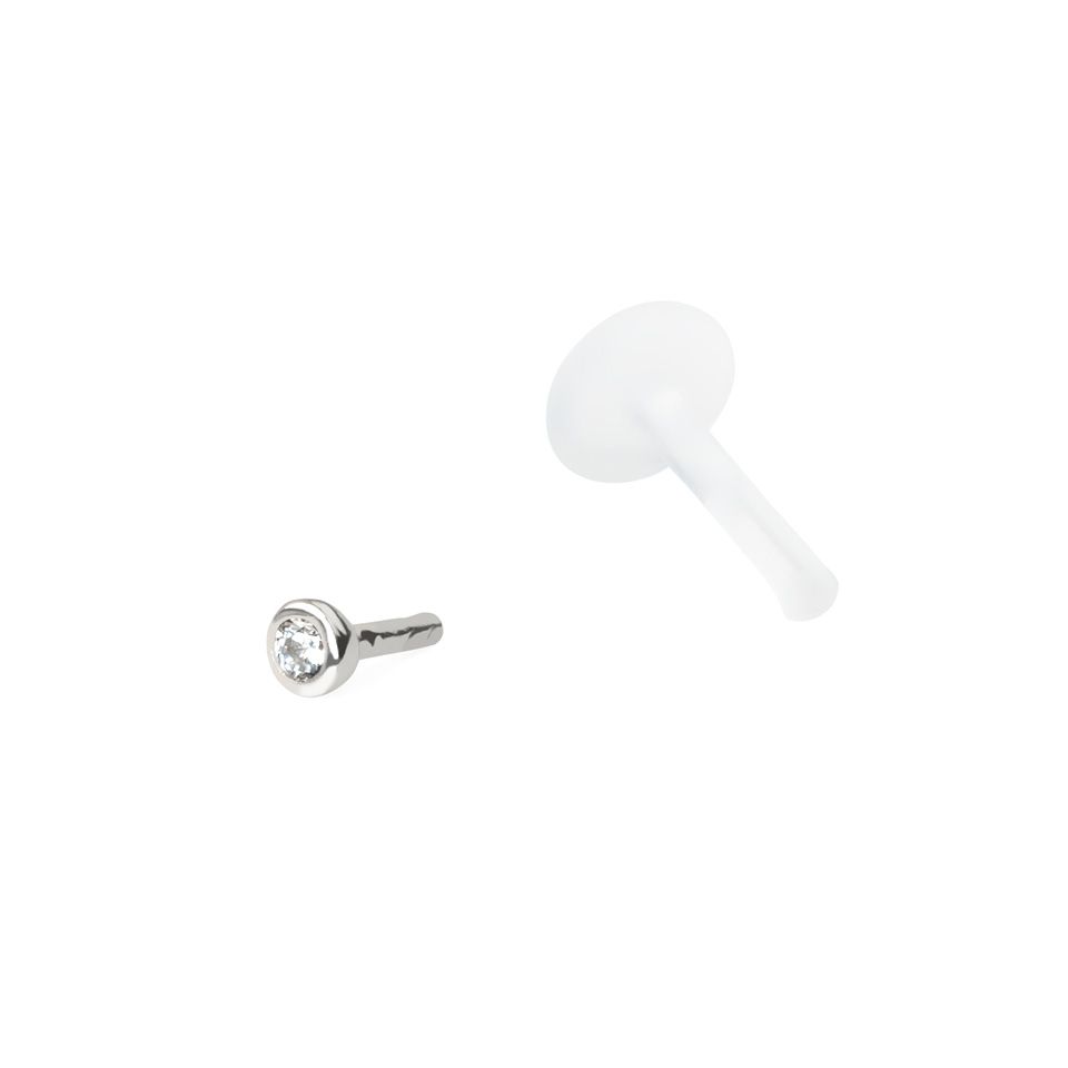 Labret av 14 karats guld med stenar och ptfe stav