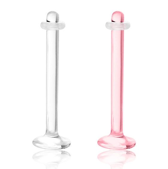 Tungpiercing retainer och gömmare