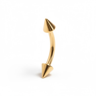 Guldpläterad böjd stav med spikar