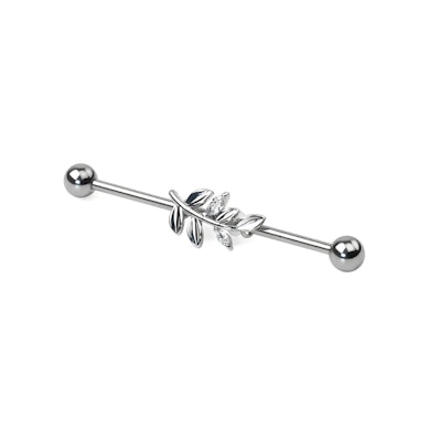 Industrial piercing med blad på gren