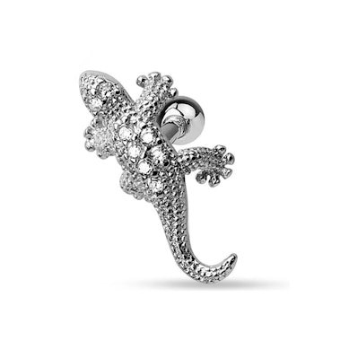 Öronpiercing med ödla och stenar