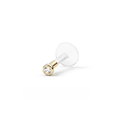 Stenprydd labret i 14k guld med ptfe-stav