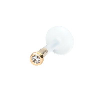 Labret av 14 karats guld med stenar och ptfe stav