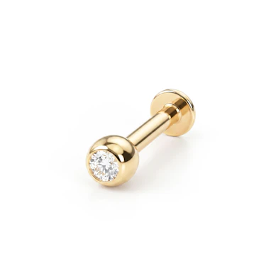 Labret av 14 kt guld med sten