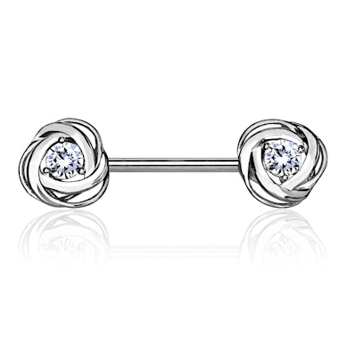 Bröstpiercing med sten i ros