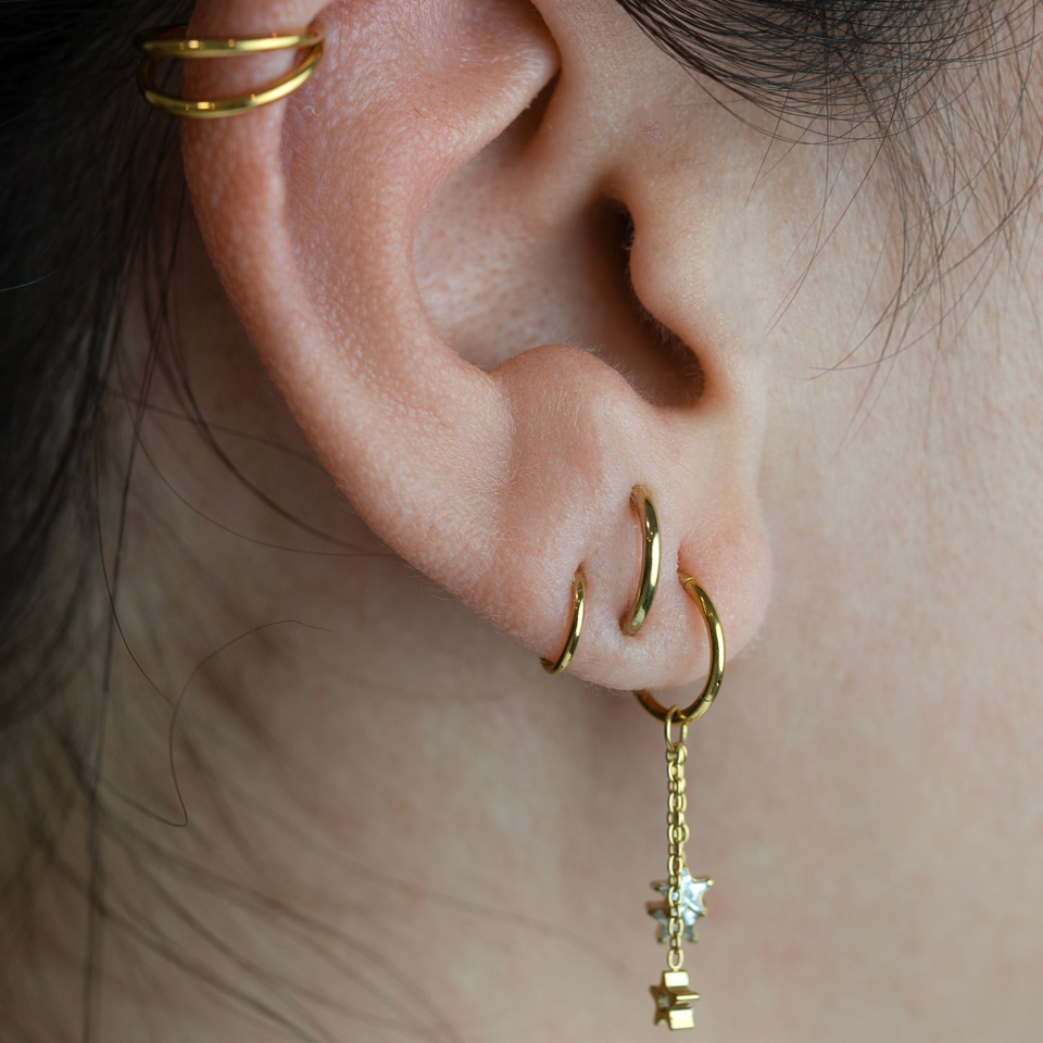 Berlock med trio av stjärnor