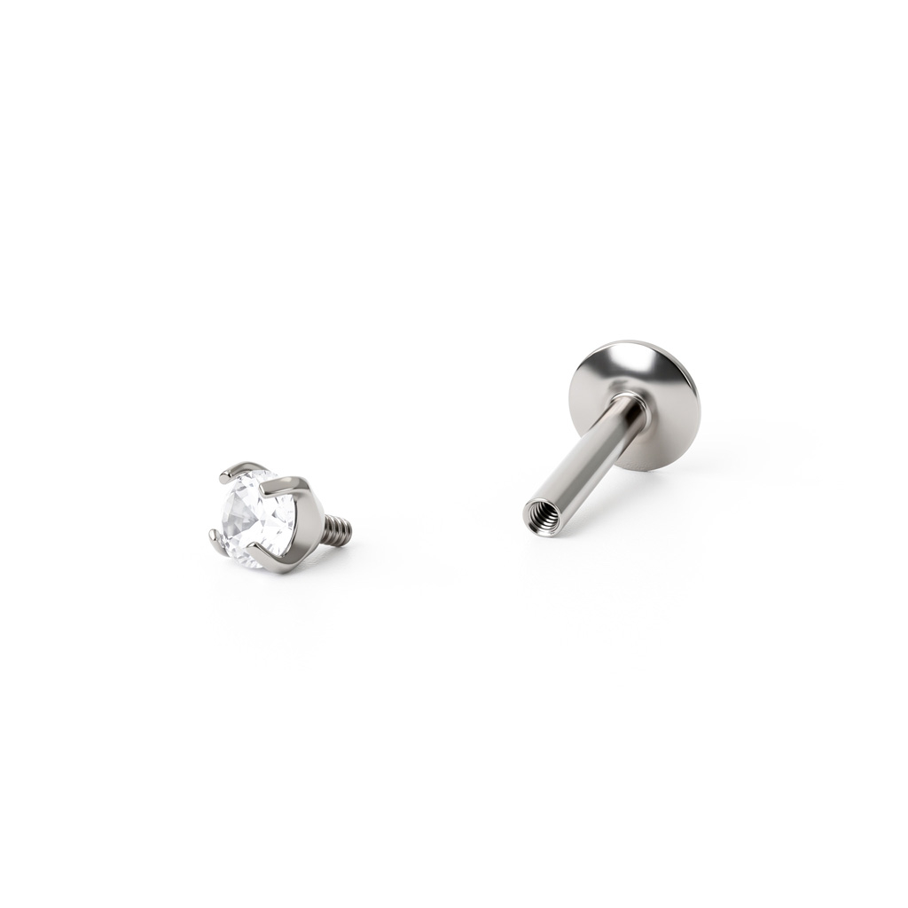 Labret av titan med olika designs