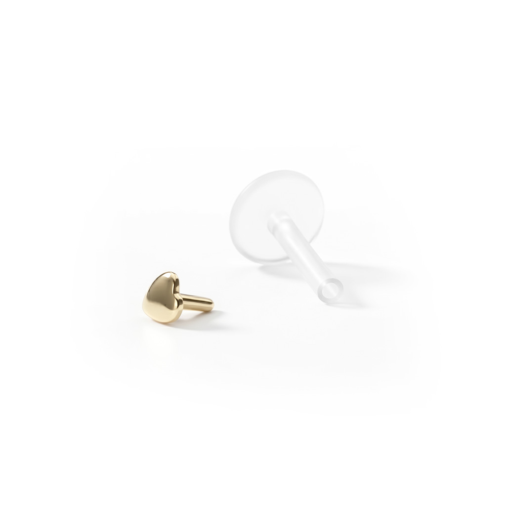 Labret av 14 karat guld med hjärttopp
