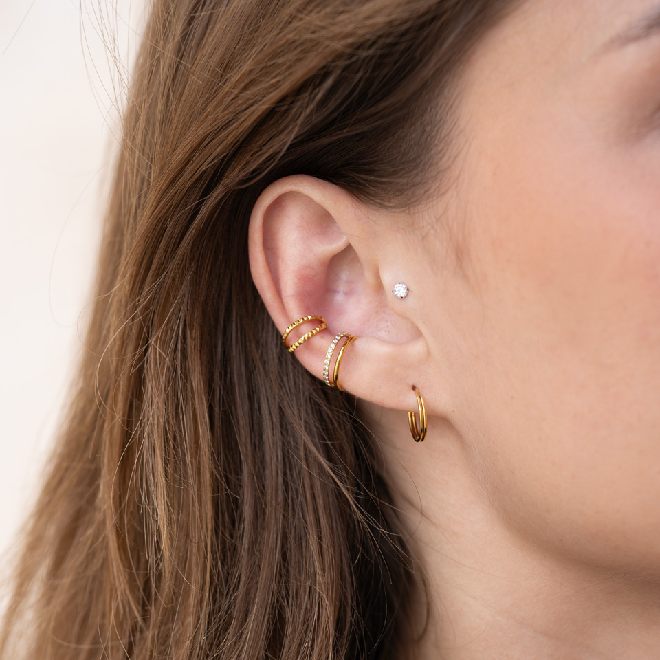 Push-in labret av titan med sten