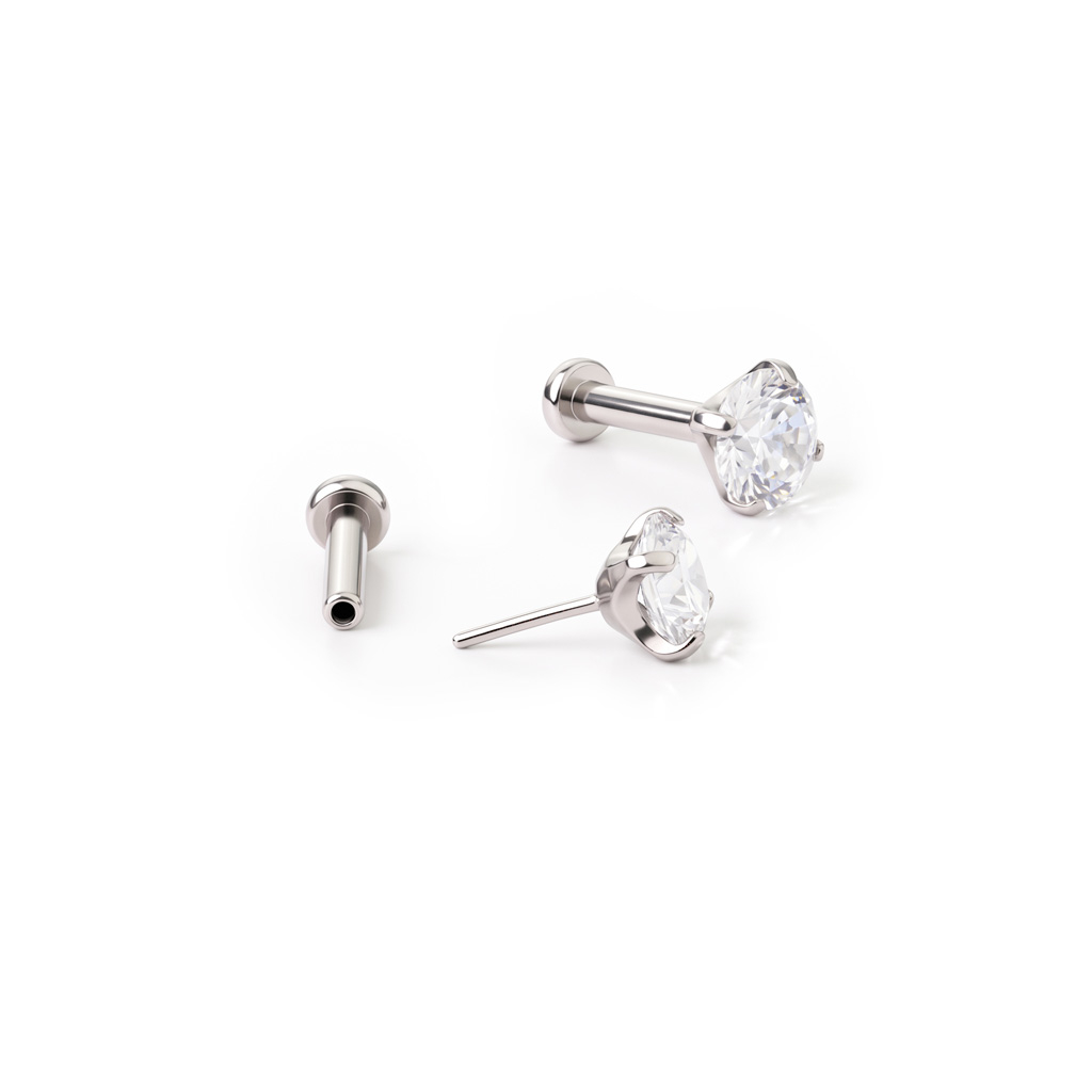 Push-in labret av titan med sten