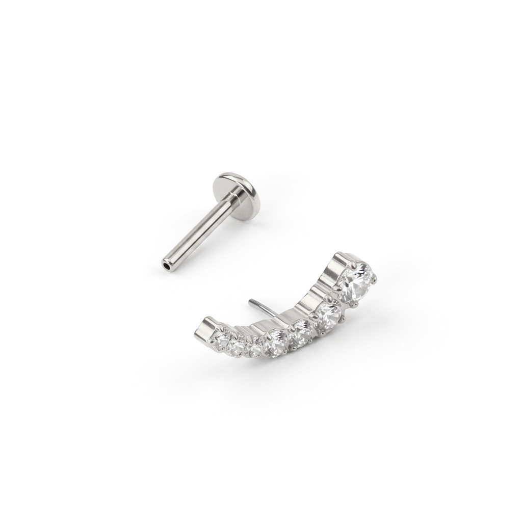 Push-in labret i titan med böjd, stenbelagd design