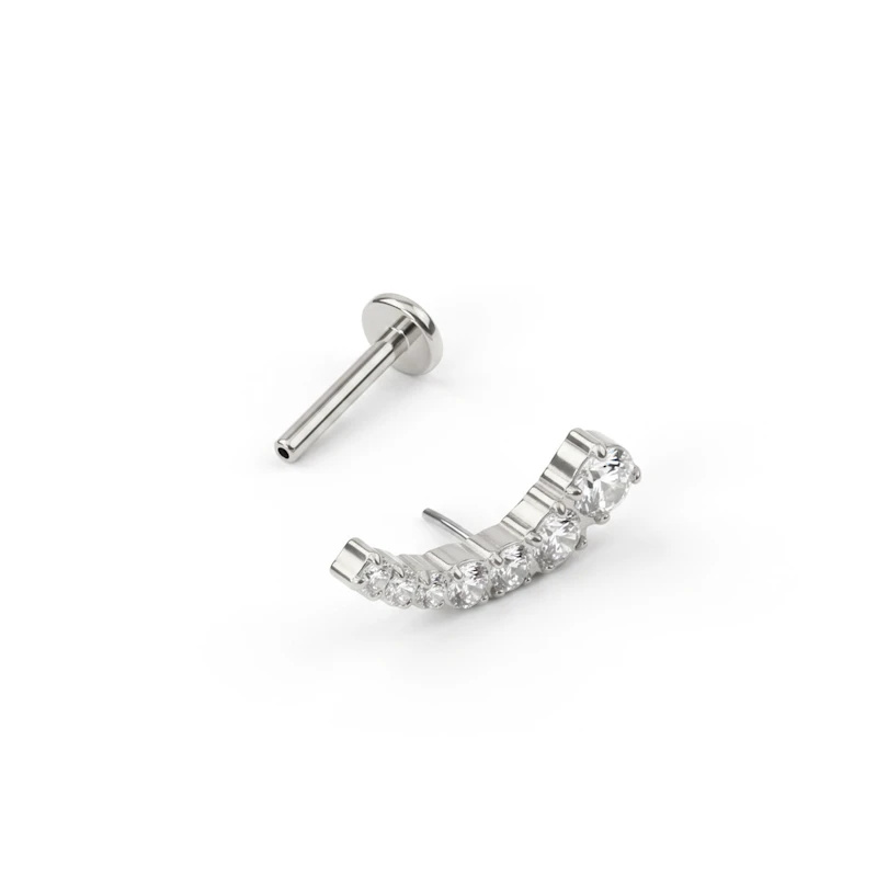 Push-in labret i titan med böjd, stenbelagd design