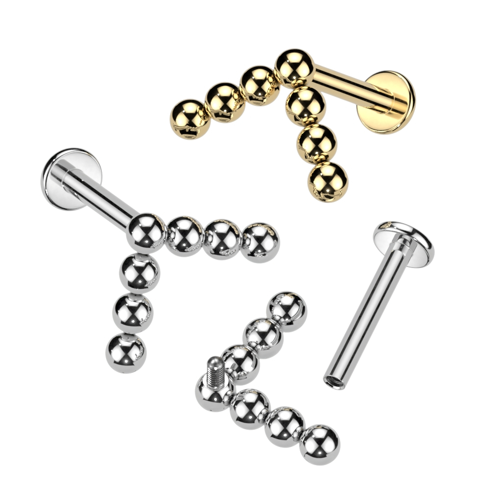 Labret i titan med kulor i chevrondesign
