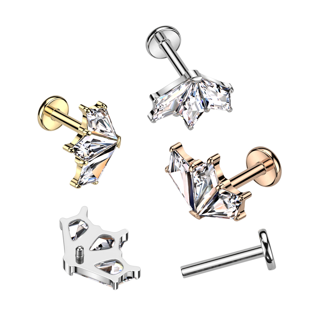 Labret av titan med tre stenar i solfjädersdesign