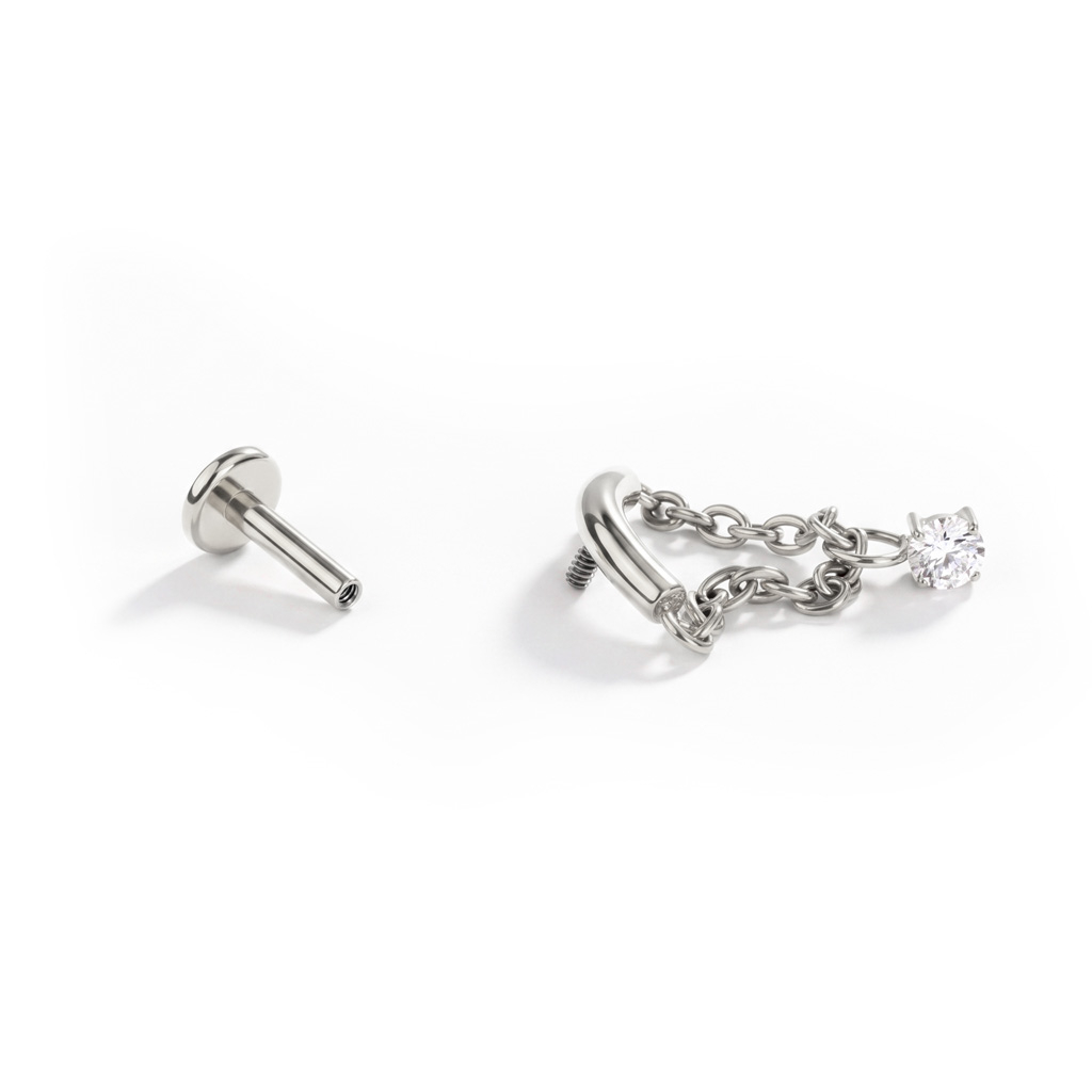 Böjd labret med kedja och stenberlock