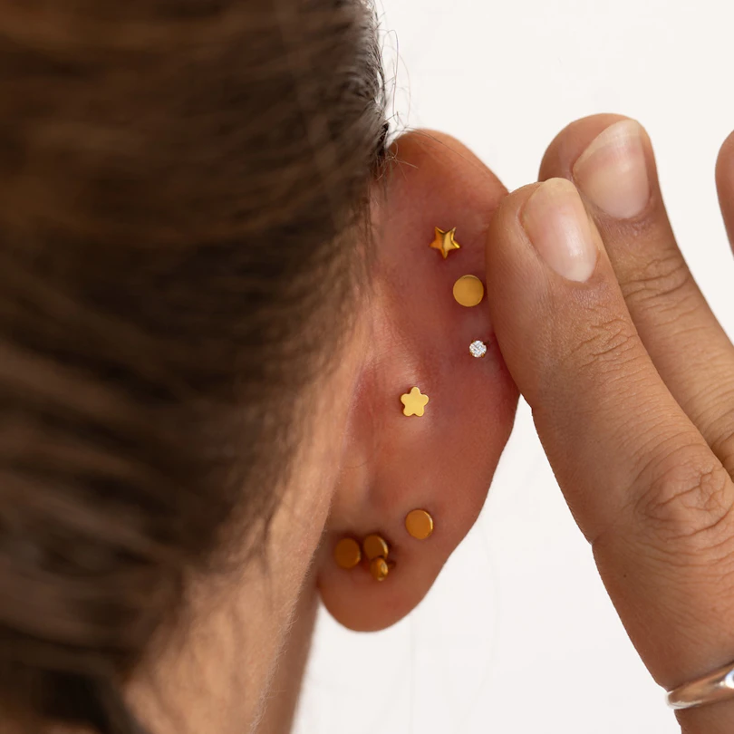 Dubbelsidig trådlös labret i titan med stjärnbaksida och sten