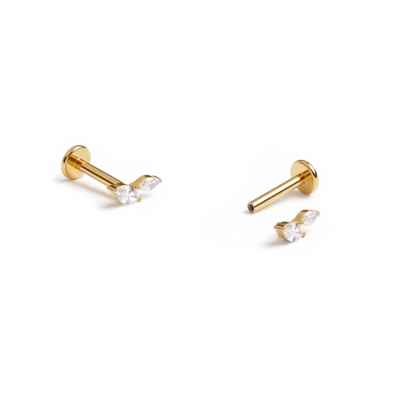 Titanlabret med två marquise-slipade stenar