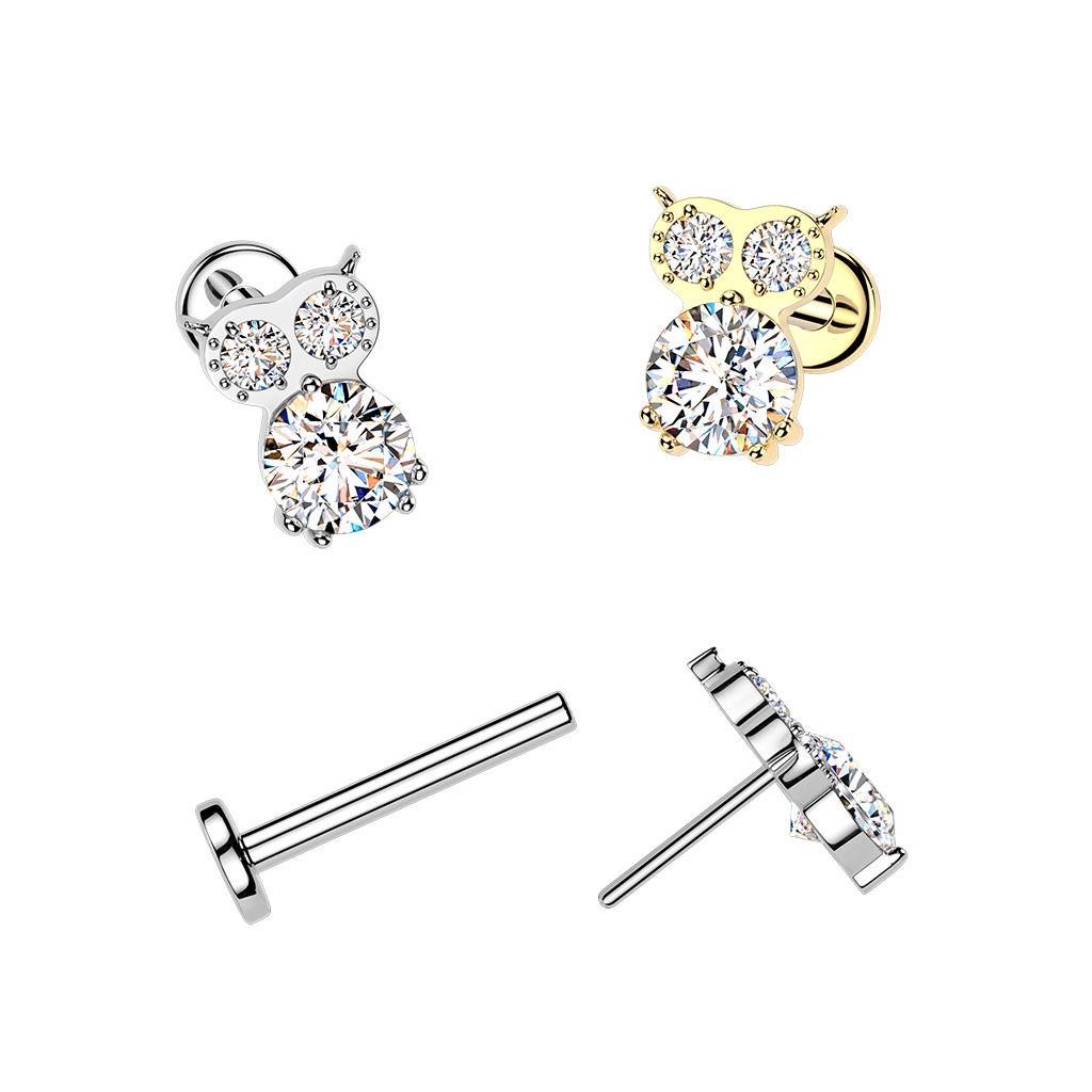 Titanlabret med stenprydd uggla