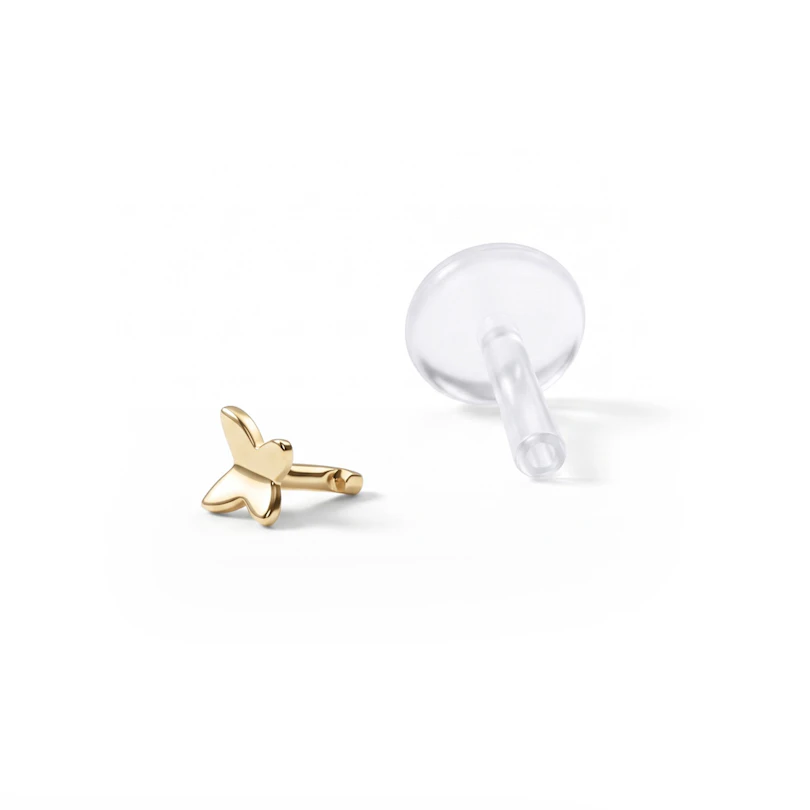 Fjäril labret av 14 karats guld med ptfe stav