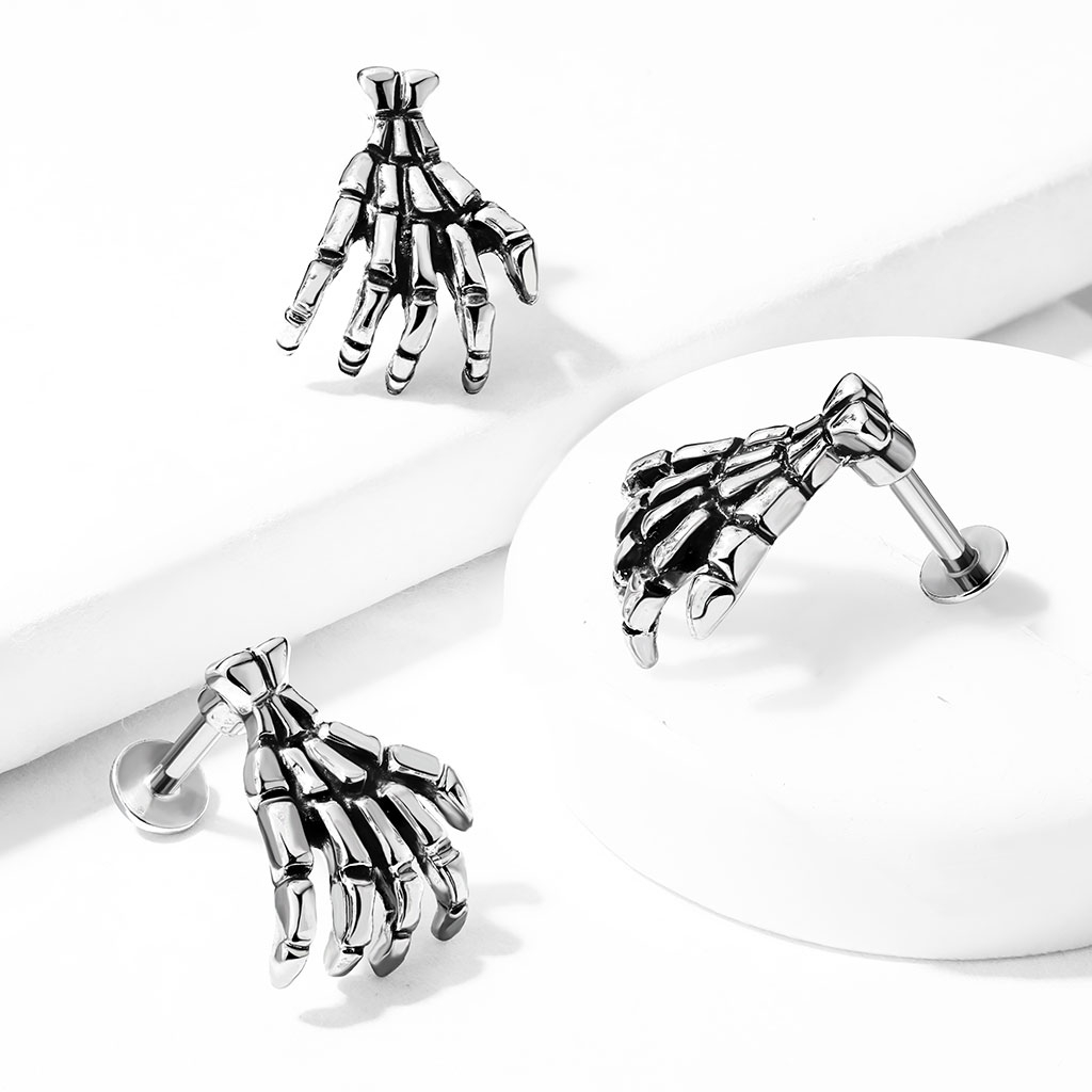 Labret med skelett hand