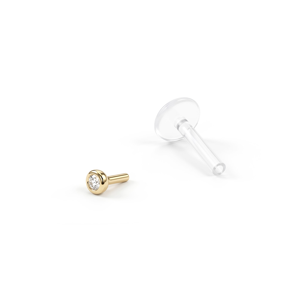 Stenprydd labret i 14k guld med ptfe-stav
