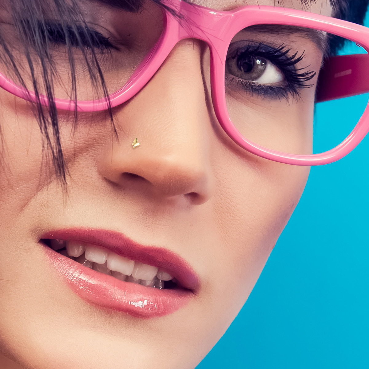 14 karats guld nässtav med fjäril