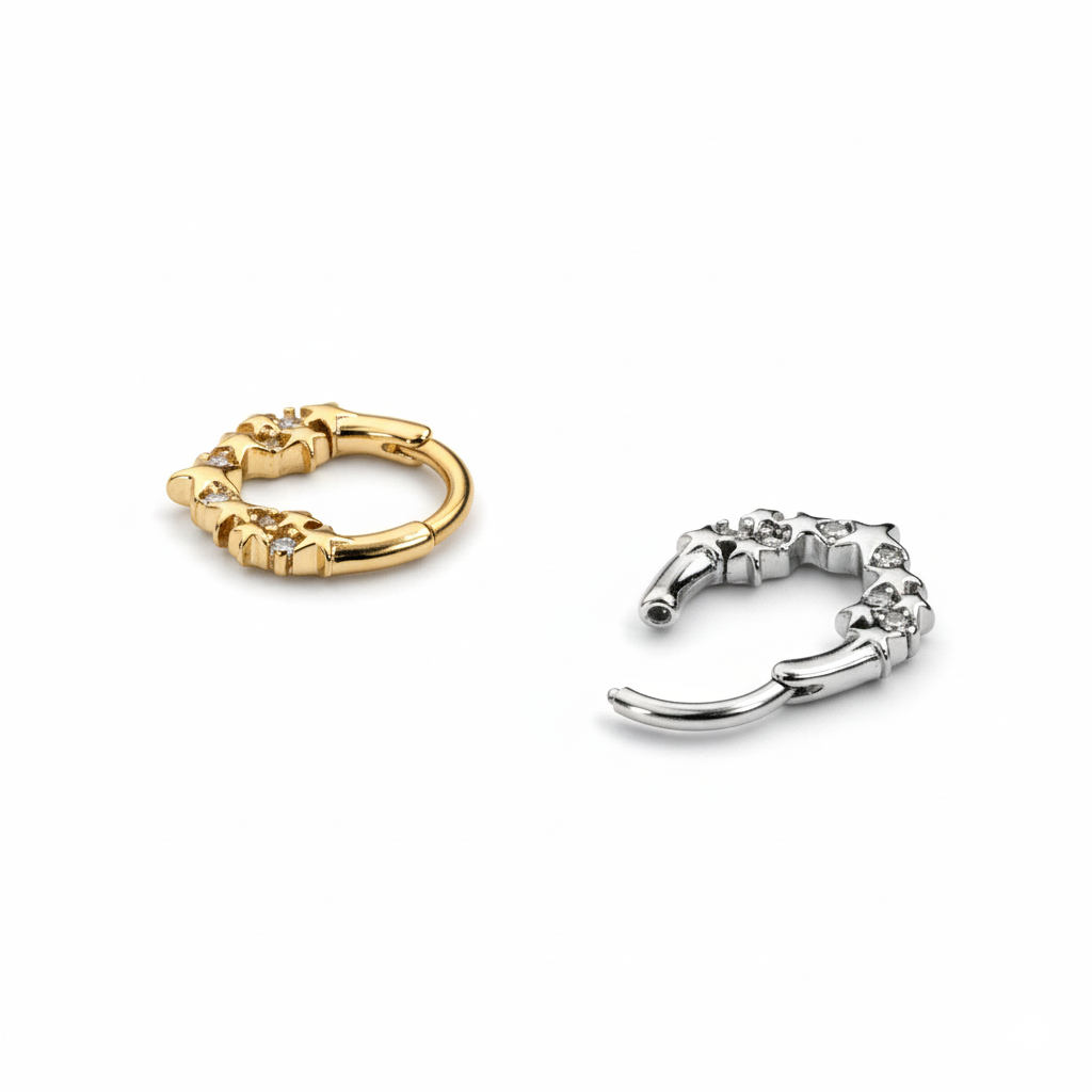 Framåtvänd ring med stjärnor och stenar