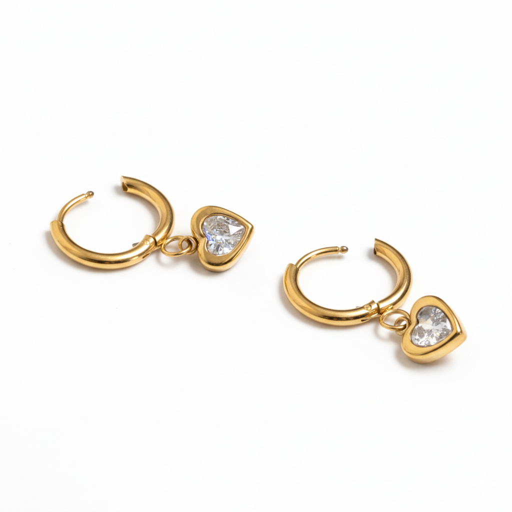 Par av ringar med hjärtberlock