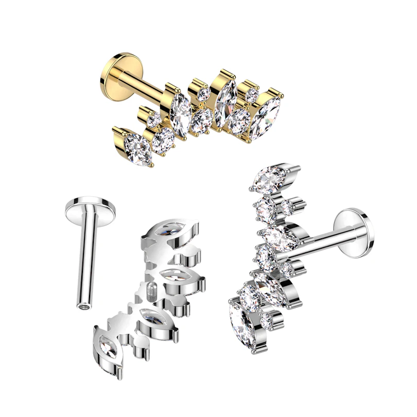 Labret i titan med marquise-stenar och runda stenar